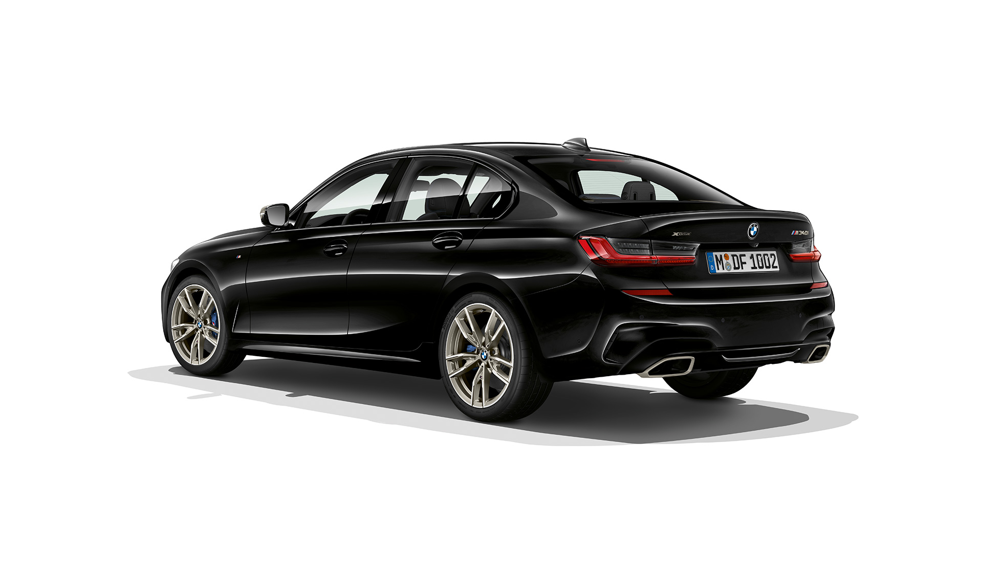 BMW Série 3 Berline, poupe M340i xDrive. Vue de trois quarts arrière de la BMW Série 3 M340i xDrive Berline.