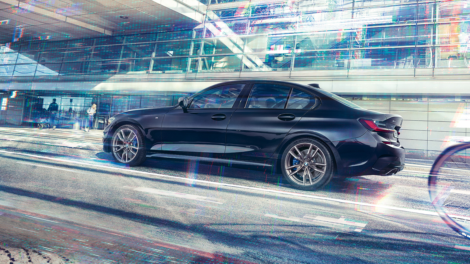 Vue latérale de la BMW M340i xDrive Berline BMW M340i xDrive Berline G20 Saphirschwarz metallic, vue latérale en mouvement