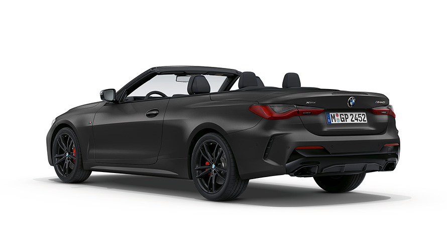 BMW M440i xDrive Cabrio G23 2020 BMW Individual Frozen Deep Grey metallic, vue de trois quarts arrière avec capote en tissu ouverte