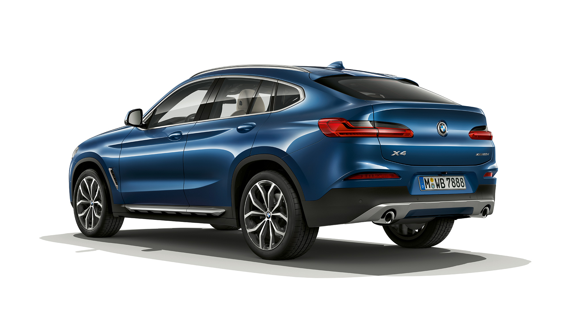 BMW X4 Modèle xLine vue de trois quarts arrière Modèle xLine G02 2018 en Phytonicblau vue de trois quarts arrière